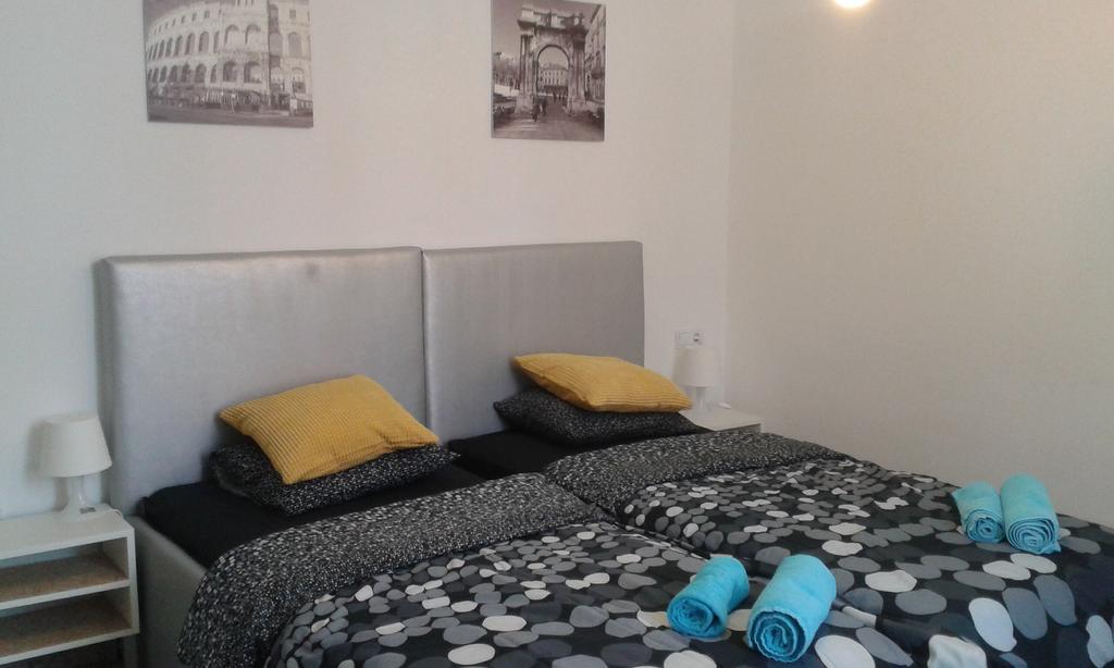 Photo of a bed in the Ljiljana hostel Room at Ljiljana Hostel