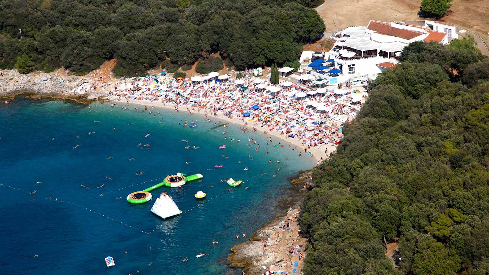 Top photo of Umbrella Beach in Pula Top view of Umbrella Beach