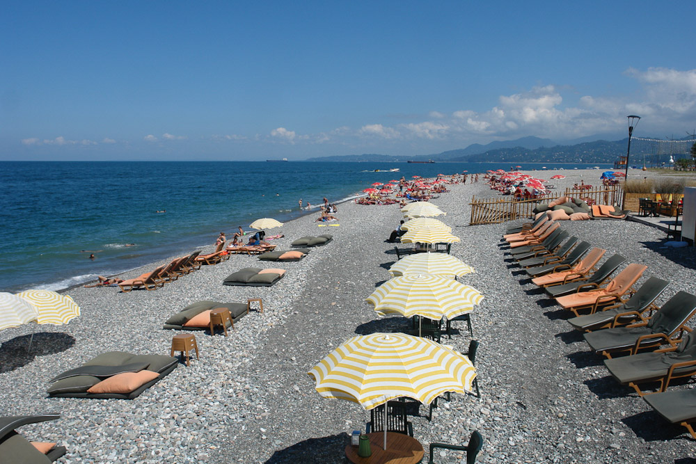 Beach chairs, sun beds and umbrellas at Kobuleti Beach Sun beds, sun beds and umbrellas