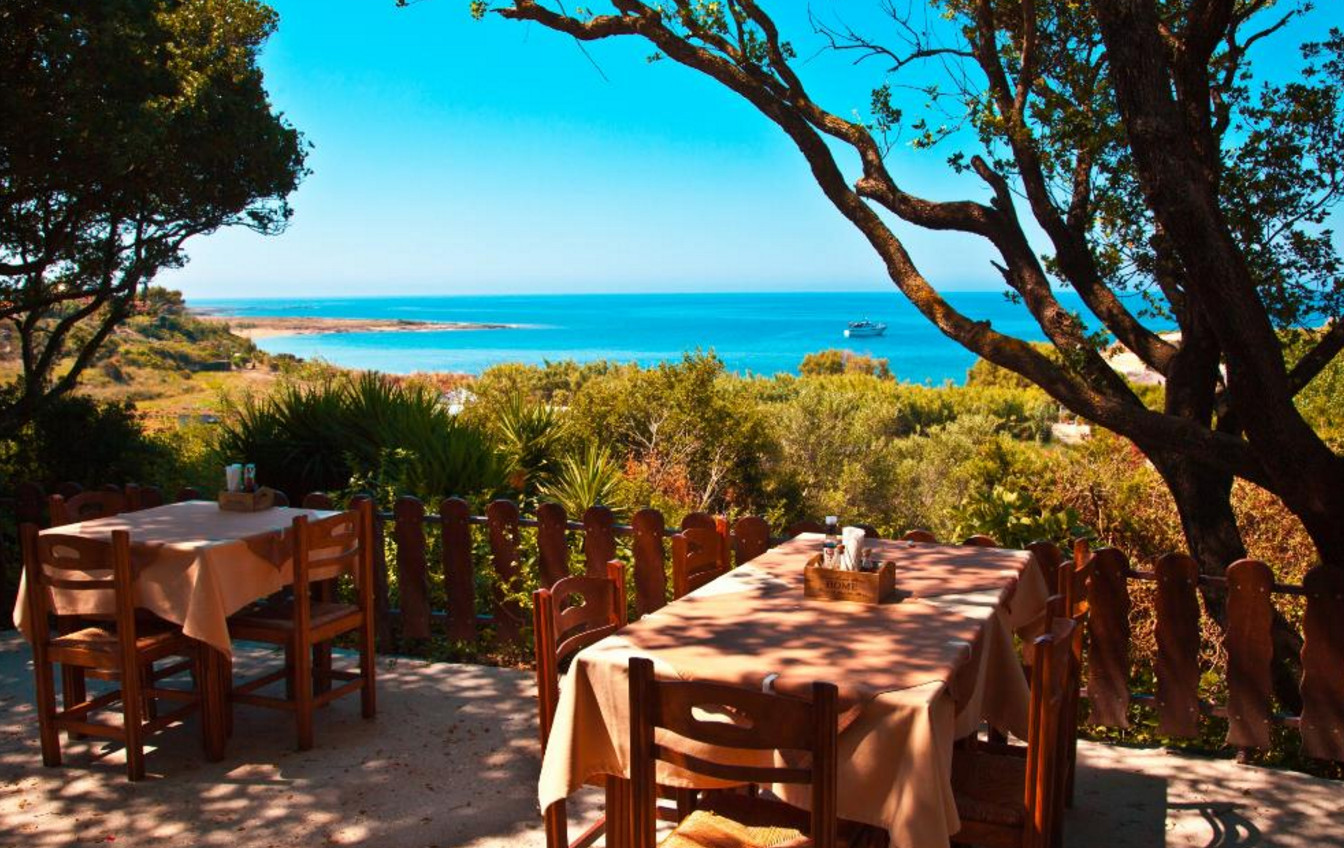 Captain Nikolas dining tables with sea view Captain Nicholas Restaurant