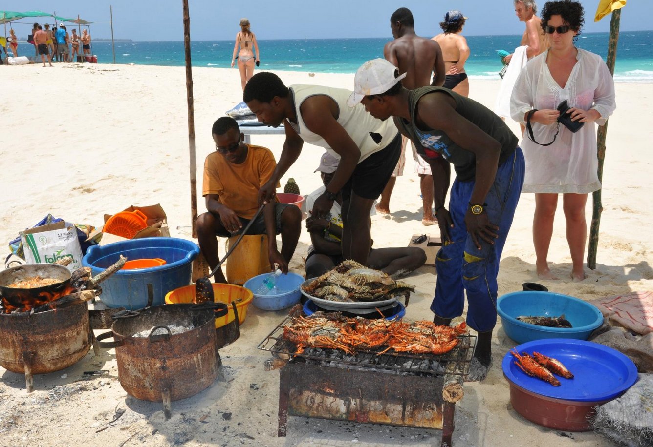 Vendors grill seafood Seafood Vendors