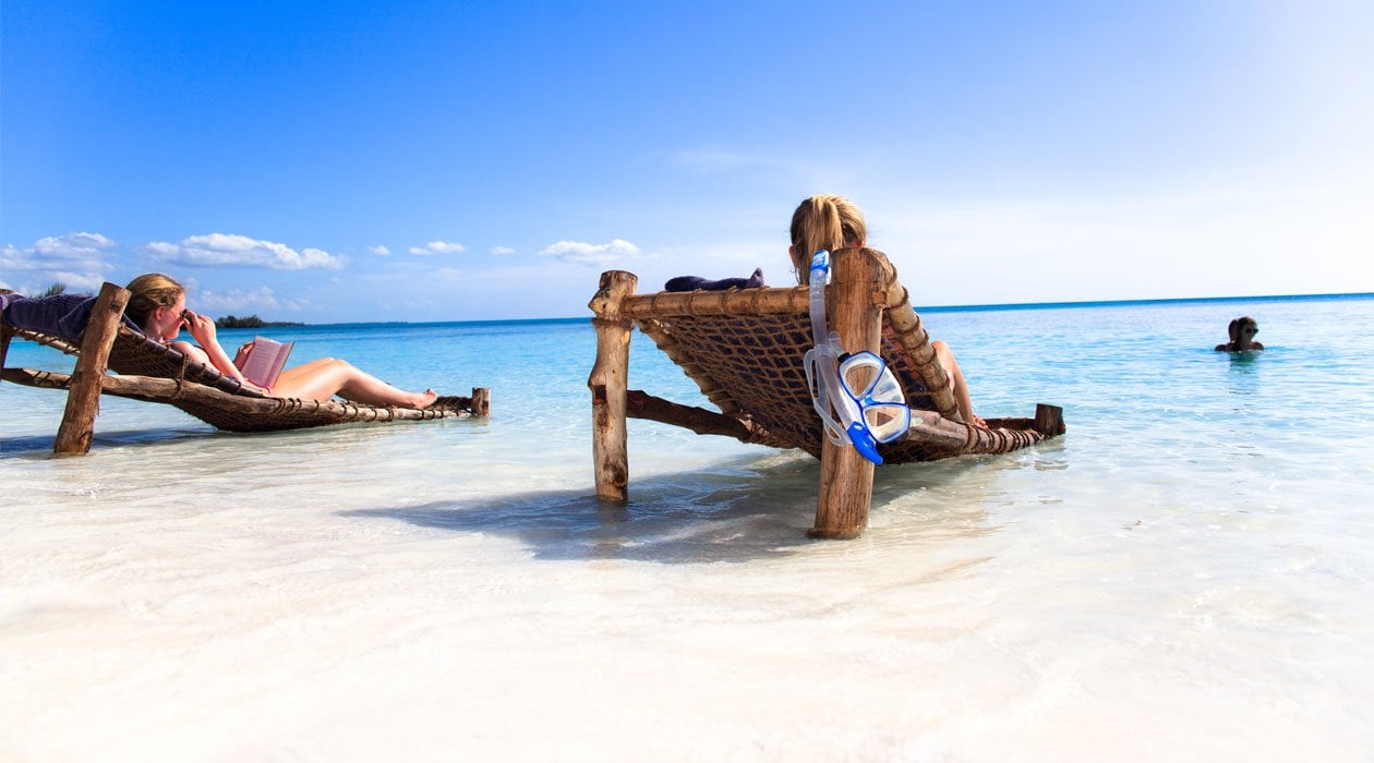 Relax on sun loungers in Zanzibar Island Vacation on the ocean coast of Zanzibar