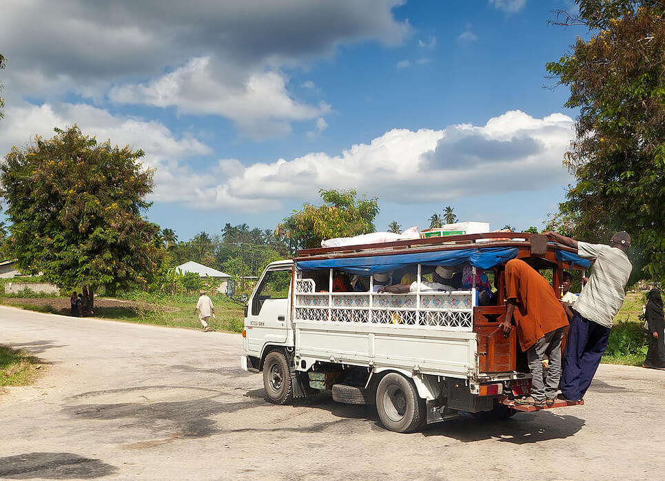 In the photo, a fixed-route taxi dala-dala Minibus "Dala-dala"