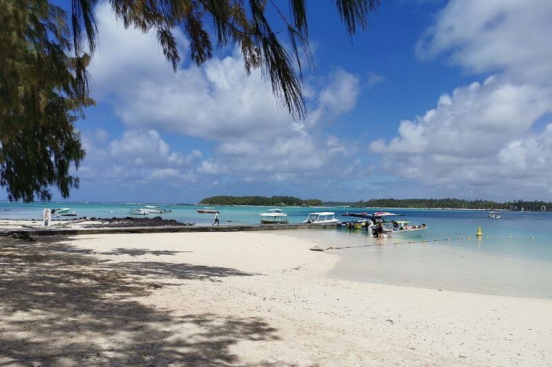Sightseeing boats at Blue Bay Beach in Mauritius Boats at the beach
