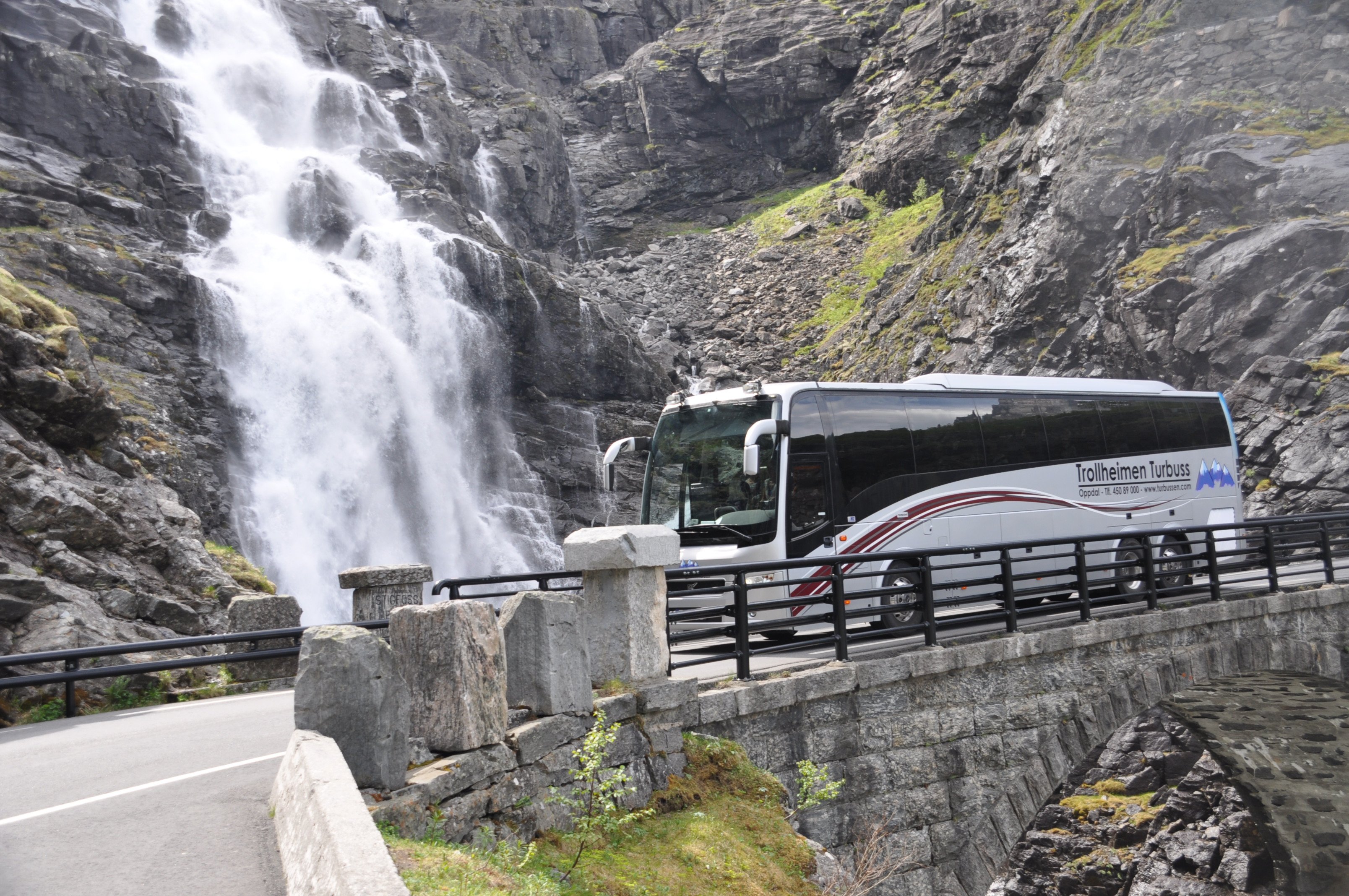Tourist bus at Stigfossen Waterfall Bus near the waterfall