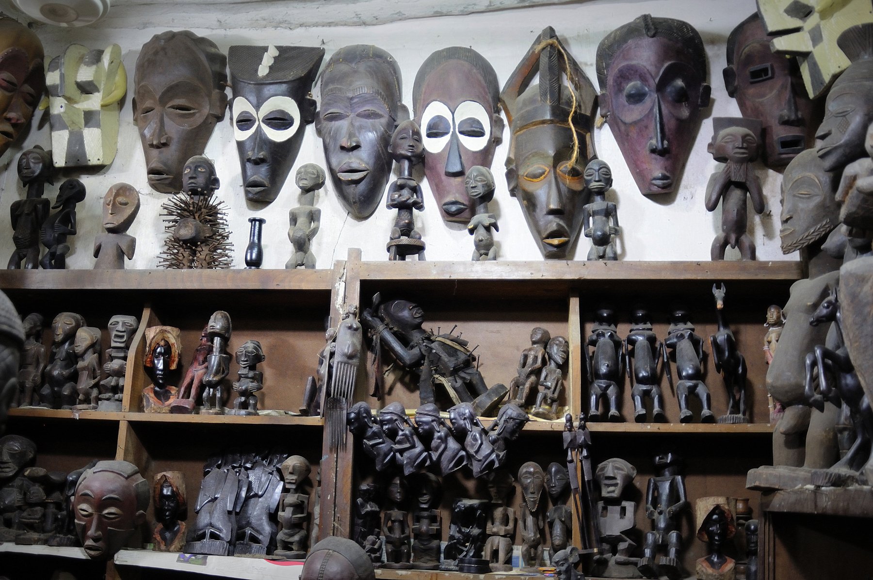 Masks and Statues at the Zanzibar Antique Shop Masks and figurines made of wood