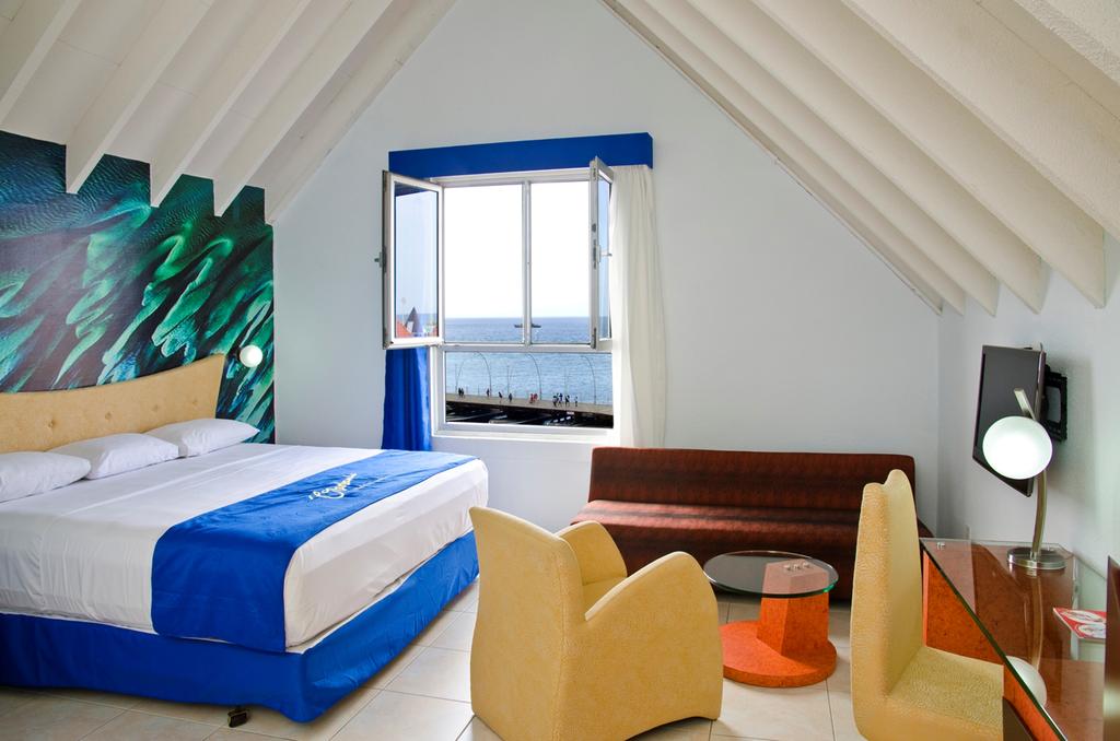Interior photo of a room at the Otrobanda Hotel Room at the 3* Otrobanda Hotel