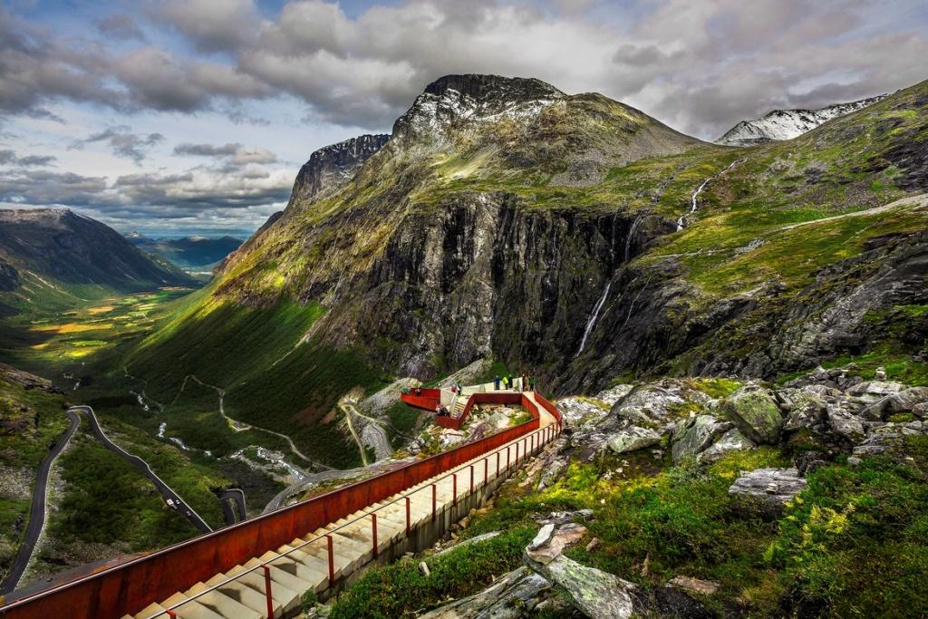 A viewing platform overlooking Trollstigen and a walking path to it A viewing platform overlooking Trollstigen