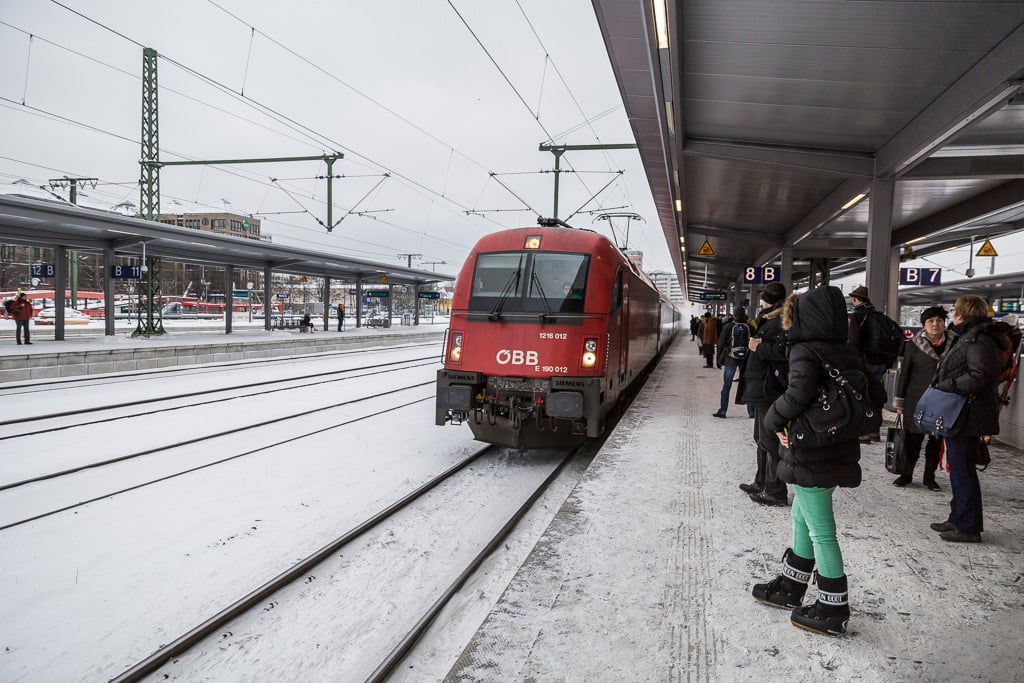 Red train at Munich railway station Train from Munich