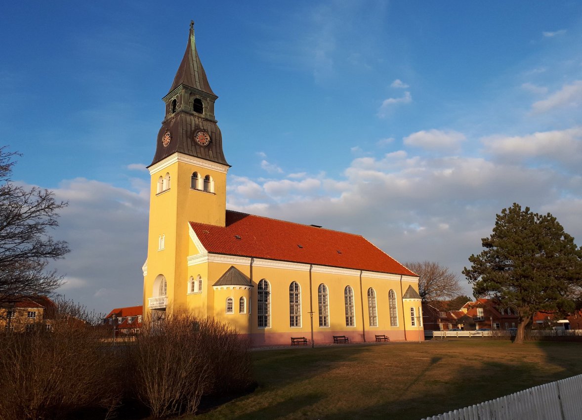 Pictured is the yellow Skagen Church Skagen Church