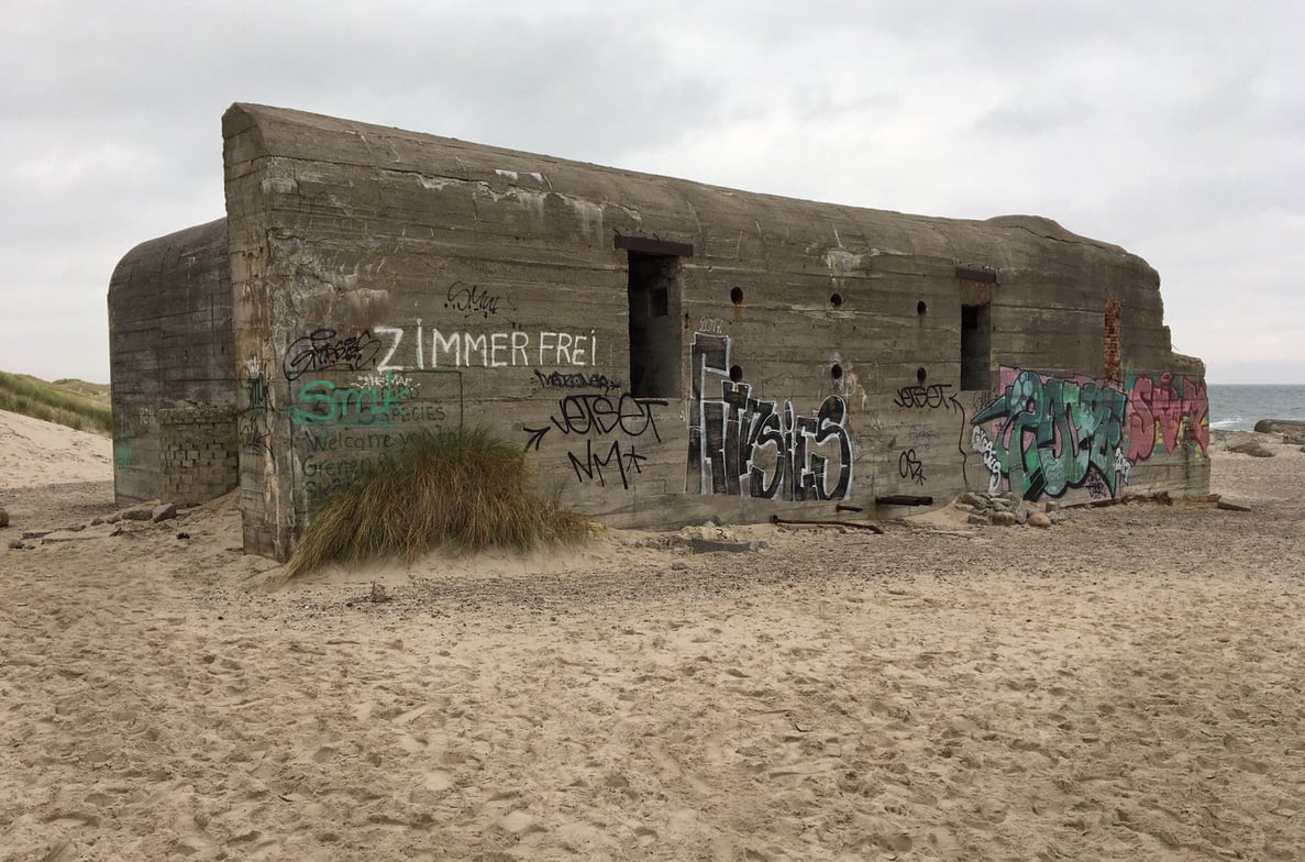The photo shows an old German bunker that survived from World War II Old German bunker