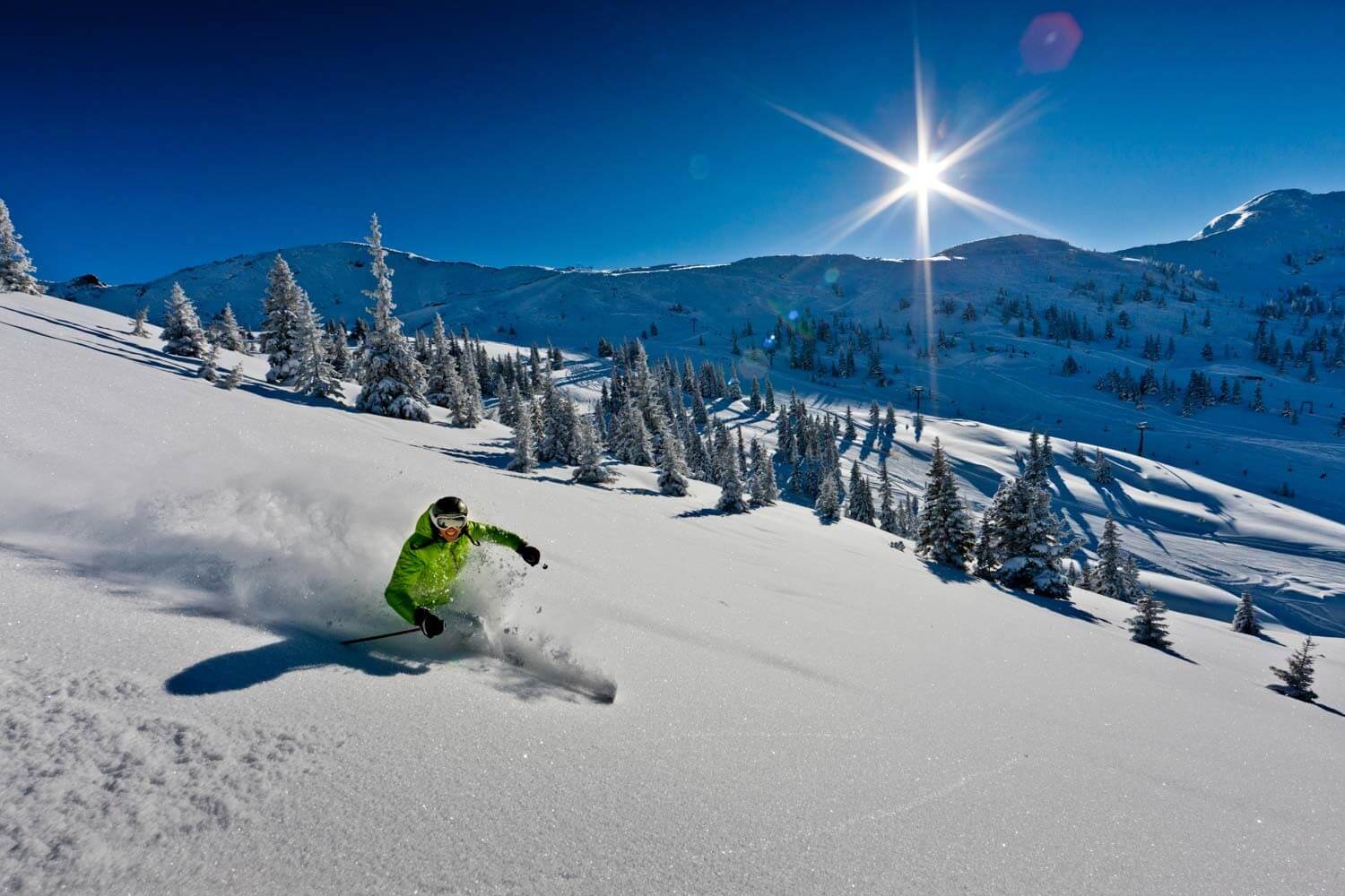 A skier descends the slope of Planneralm Planneralm Slope