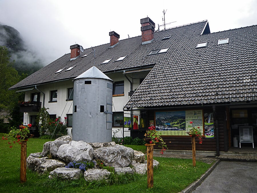 In front of the tourism office, there is a model of a metal tower like the one on top of Triglav. By the Tourism Office