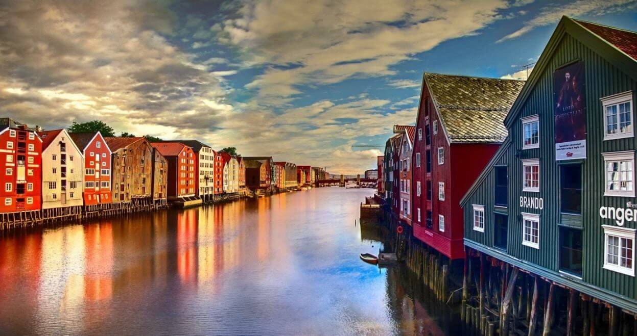 Small houses painted in different colors View from the bridge to the old part of the city