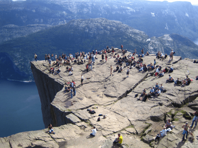 Tourists on Preikestolen Cliff Tourists on Prekestulen